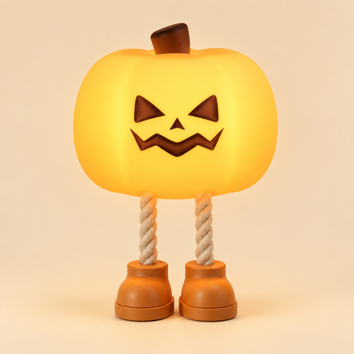 The Lil Pumpkin Lamp glowing warm orange